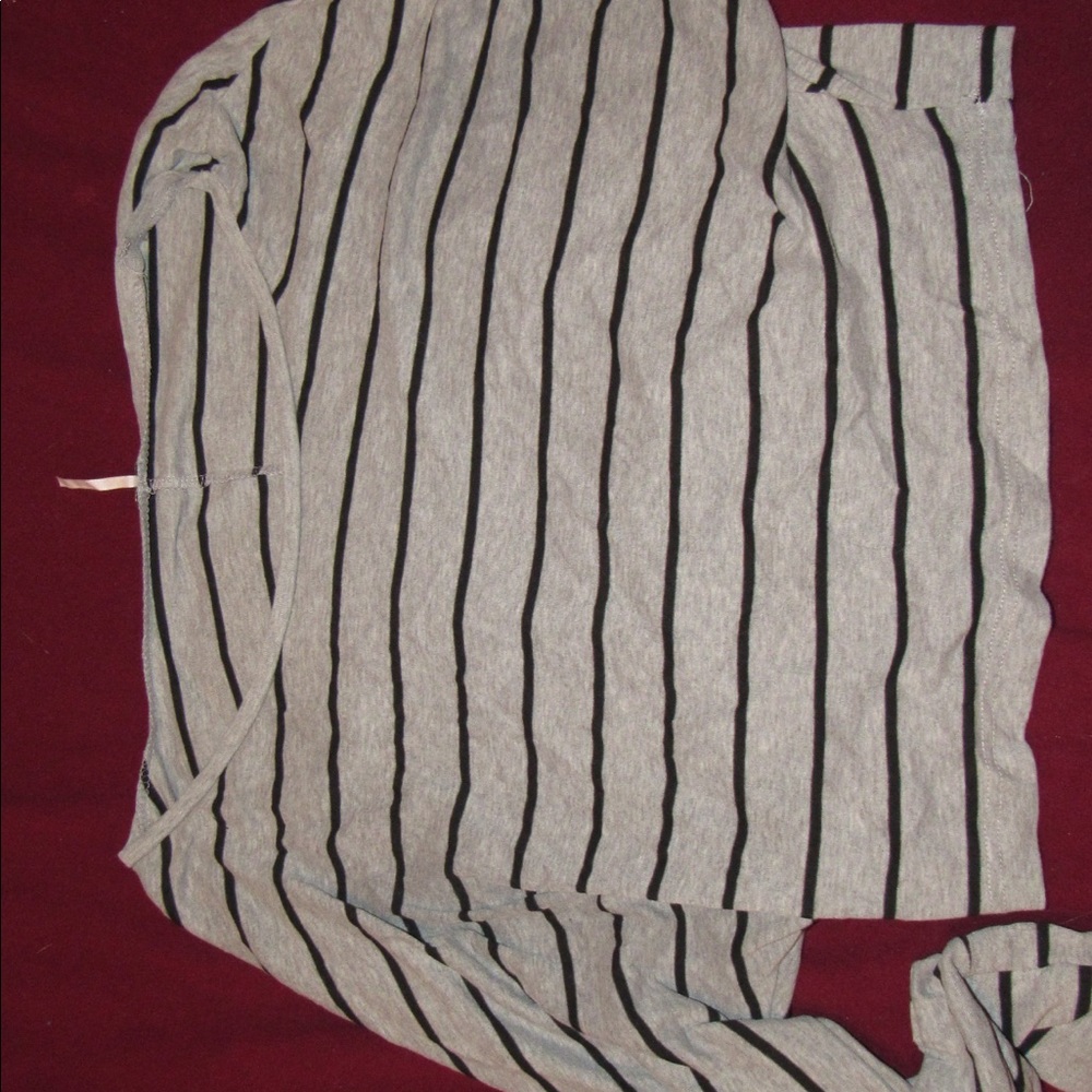 Cropped, long sleeve striped shirt.
